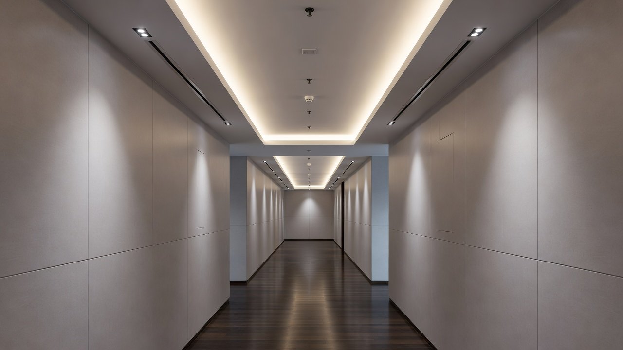Modern hotel corridor with climate control and lighting systems visible in professional hospitality setting