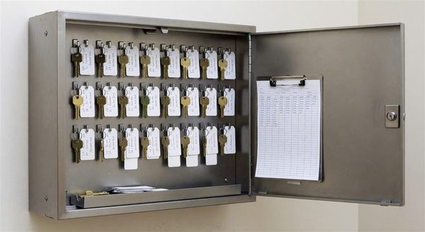 Hotel key control cabinet with organized physical key tracking system