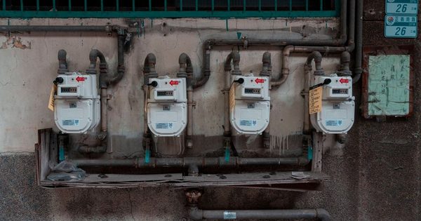 Hotel commercial kitchen gas equipment with gas shutoff valves visible