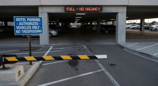 Hotel security camera monitoring parking facility entrance
