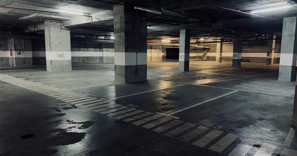 Hotel parking structure showing concrete deck and drainage systems