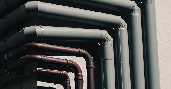 Hotel mechanical room with domestic hot water heaters and piping