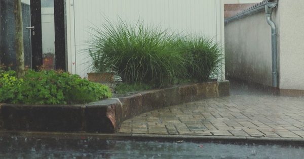 Hotel parking lot drainage system with catch basin and stormwater management